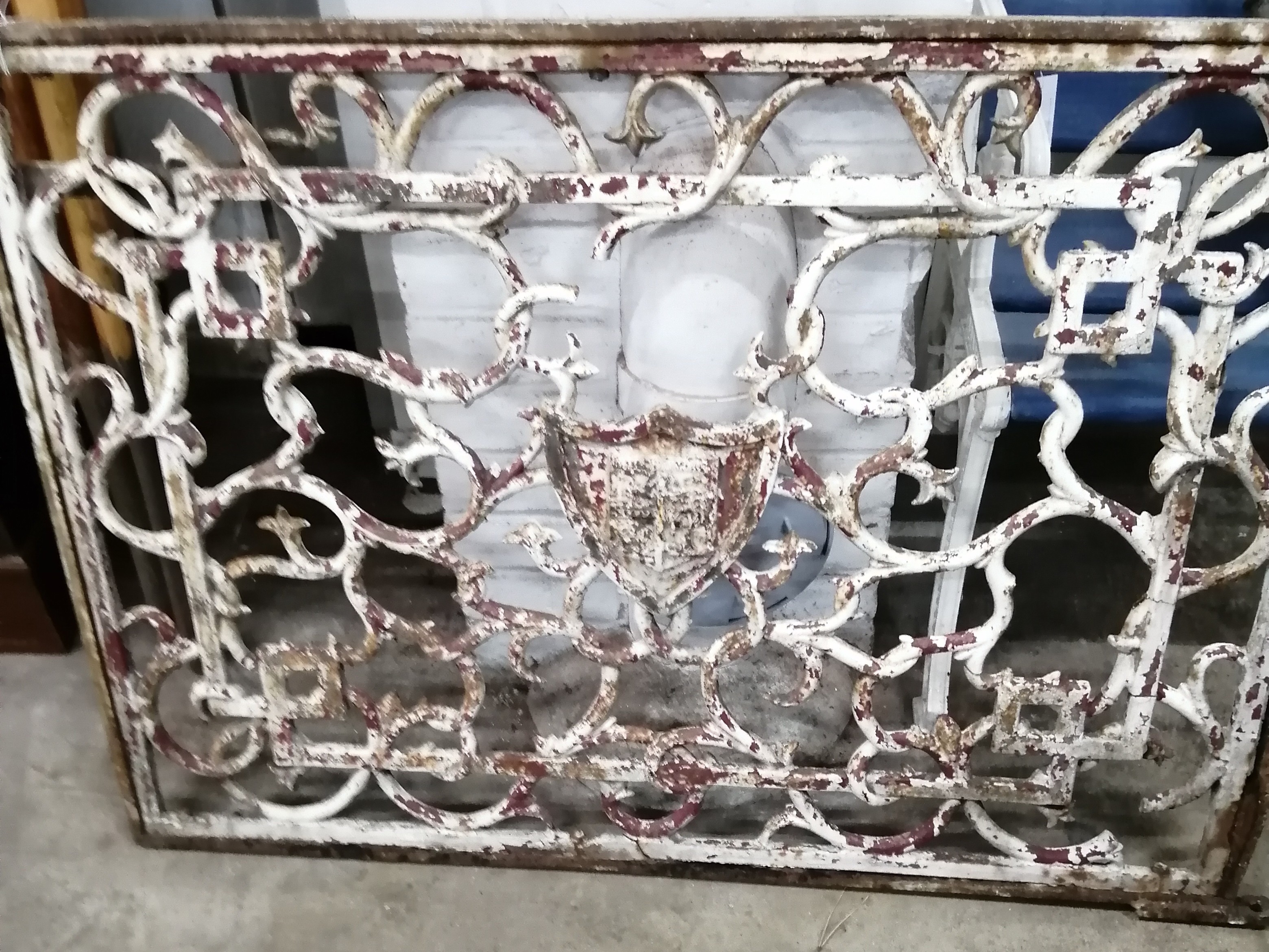 A rectangular cast iron armorial panel